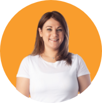 Image of a smiling tanned woman in a white t-shirt.