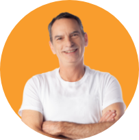 Image of a smiling white man in a white t-shirt.